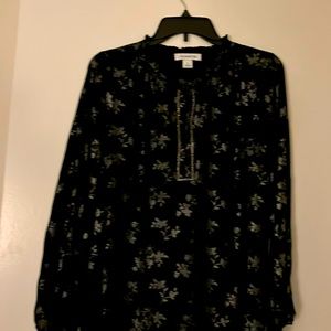 Elegant back and silver blouse